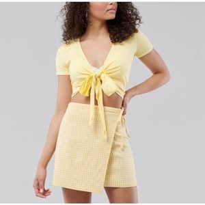 Hollister yellow multi way crop shirt